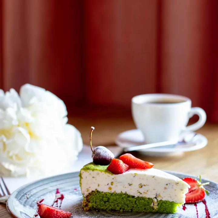 Фисташковый чизкейк в Coffe Club - фото позиции меню кафе